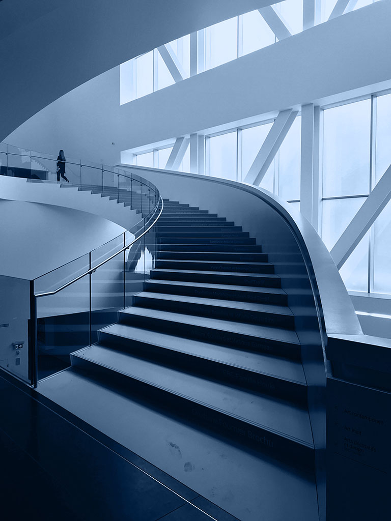 Man walking office stairs